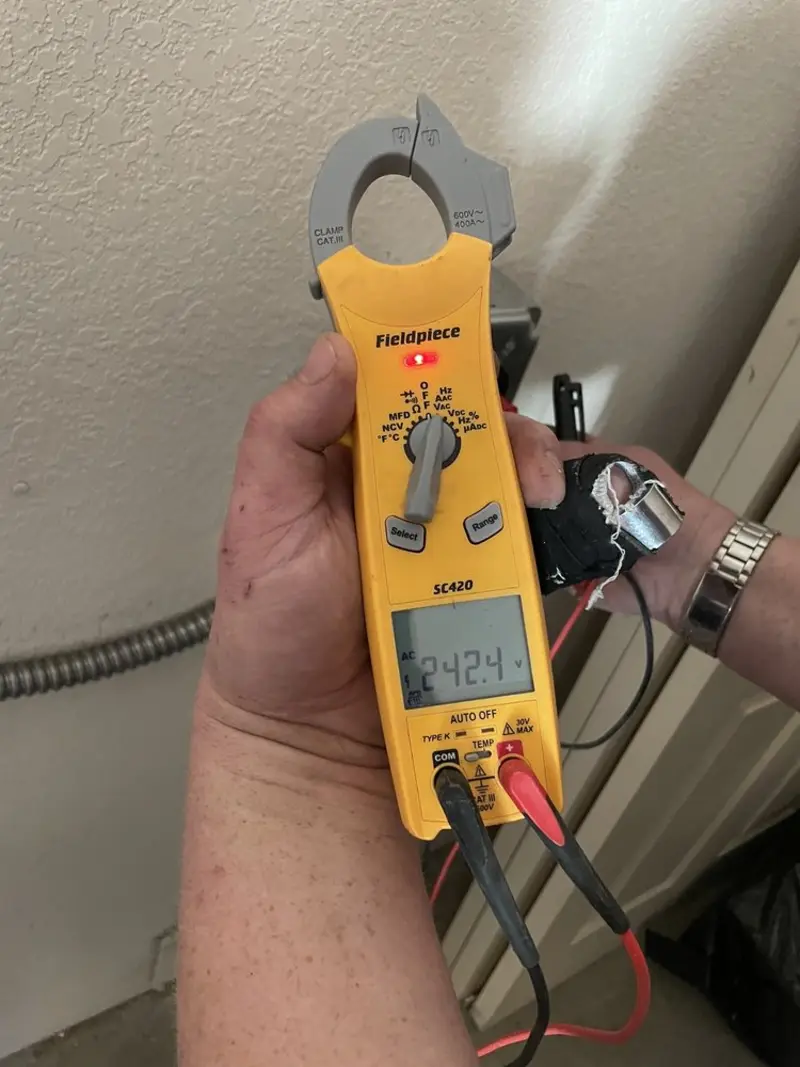 Voltage testing with clamp meter during Circuit Breaker Repair in Cullowhee